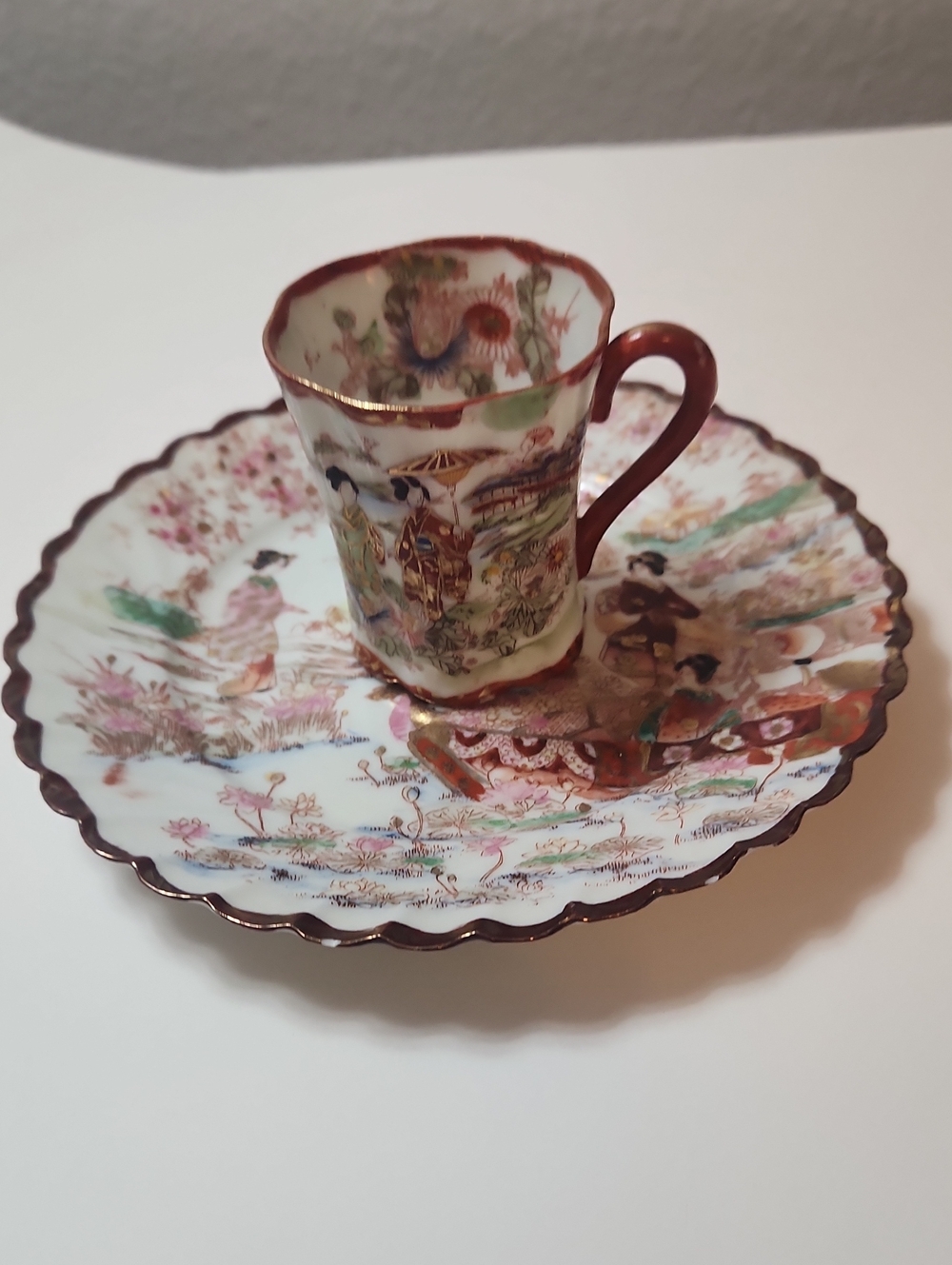 vintage Japanese hand-painted porcelain teacup and saucer set